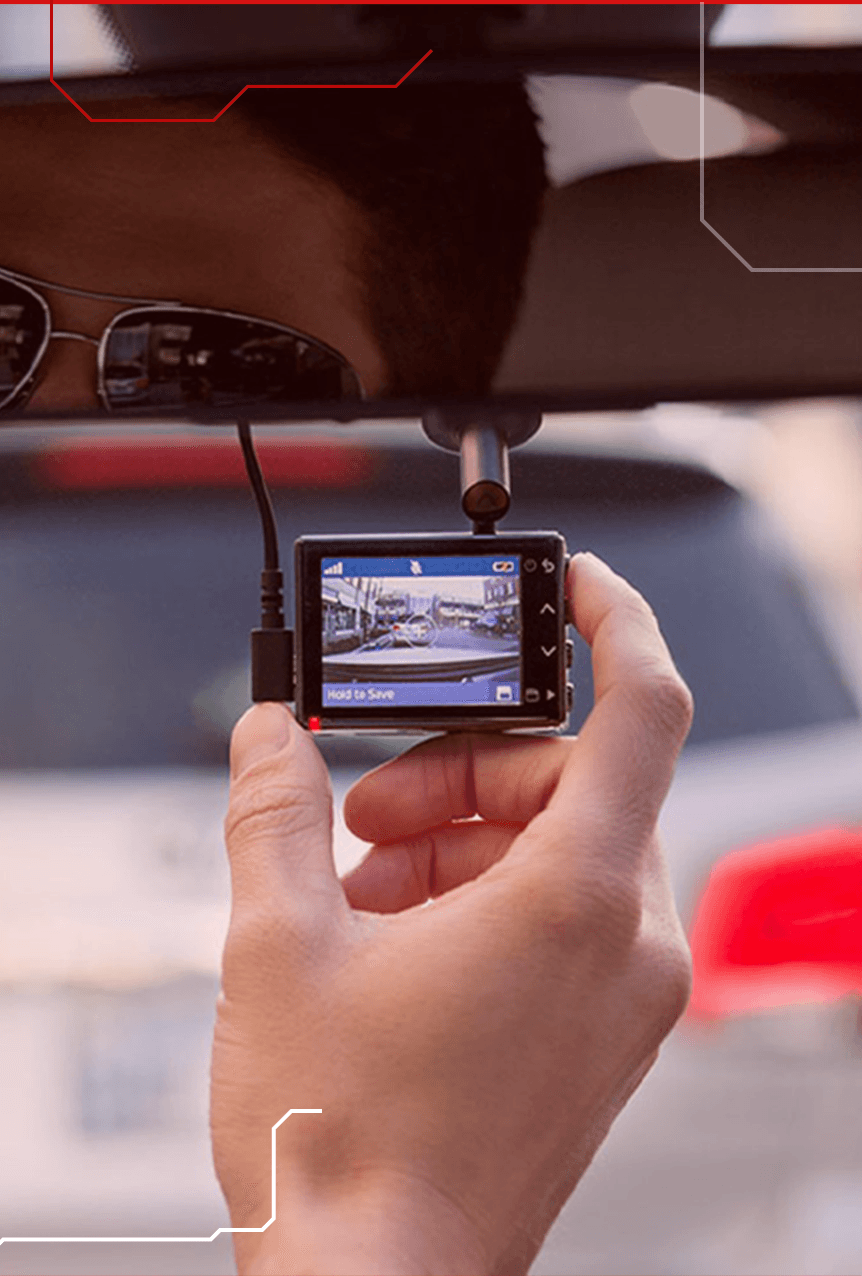 Dashcam mounted behind a windscreen